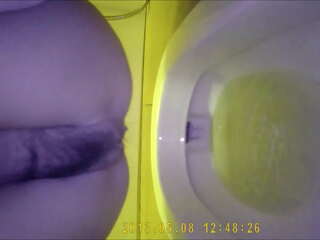 Asian teen pee in toilet