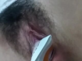 Webcampornlive.com -  asian teen fuck herself with a cream tube on webcam